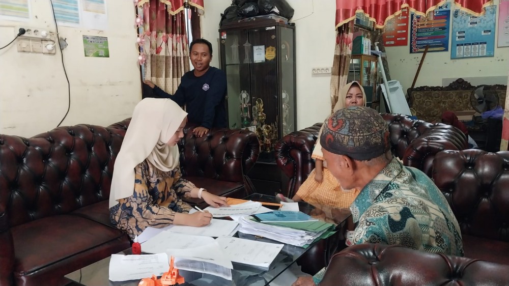 Desa Gumbil Gelar Penyaluran Bantuan Beras Bulog